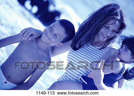 people, smiling, mother, Hispanic, beach, vacations, family View Large Photo Image Stock Image - people, smiling, mother, Hispanic, beach, vacations, family. Fotosearch