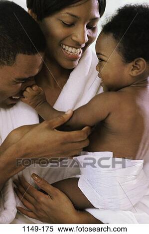 Stock Photography - people, smiling, nose, mother, baby, laughing, holding. Fotosearch