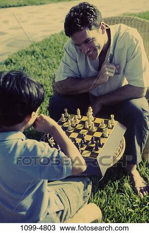 people, smiling, playing, chess, Hispanic, smile, family View Large Photo Image Stock Image - people, smiling, playing, chess, Hispanic, smile, family. Fotosearch