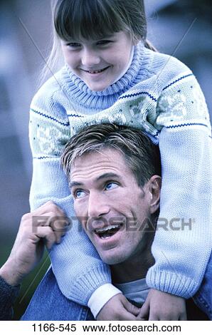 people, smiling, sweater, riding, outdoors, carrying, smile View Large Photo Image Stock Photography - people, smiling, sweater, riding, outdoors, carrying, smile. Fotosearch