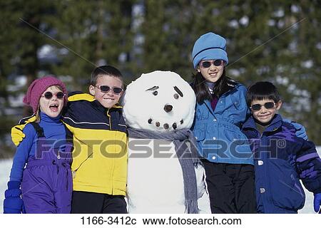 people, snow, smiling, playing, winter, sunglasses, outdoors View Large Photo Image Stock Image - people, snow, smiling, playing, winter, sunglasses, outdoors. Fotosearch