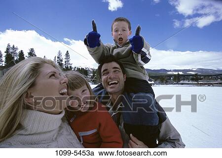 Stock Image - people, snow, winter, gesturing, outdoors, family, gesture. Fotosearch