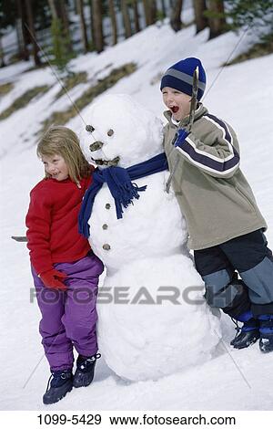 people, snow, winter, outdoors, jackets, children, scarf View Large Photo Image Stock Photo - people, snow, winter, outdoors, jackets, children, scarf. Fotosearch