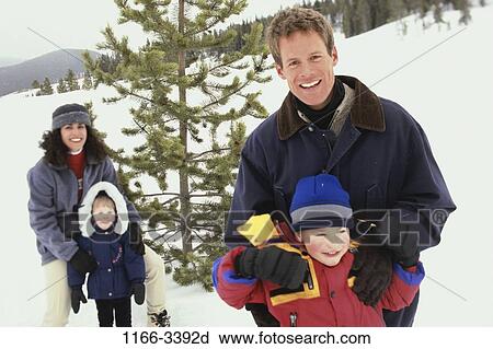 people, snow, winter, playful, outdoors, family, coats View Large Photo Image Stock Image - people, snow, winter, playful, outdoors, family, coats. Fotosearch