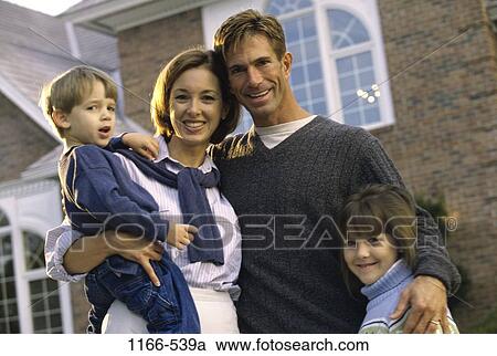 people, standing, outdoors, house, family, stand View Large Photo Image Stock Image - people, standing, outdoors, house, family, stand. Fotosearch