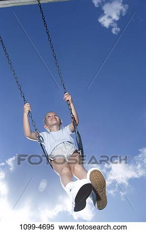 people, swinging, girl, swing, playground, outdoors, Caucasian View Large Photo Image Stock Photography - people, swinging, girl, swing, playground, outdoors, Caucasian. Fotosearch