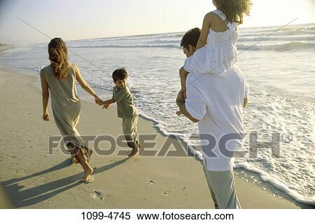 people, walking, beach, summer, outdoors, outings, unity View Large Photo Image Stock Photography - people, walking, beach, summer, outdoors, outings, unity. Fotosearch