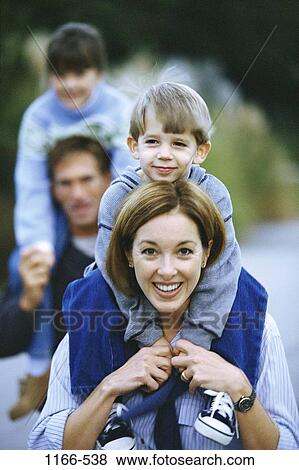 people, walking, riding, outdoors, carrying, family, ride View Large Photo Image Stock Photo - people, walking, riding, outdoors, carrying, family, ride. Fotosearch