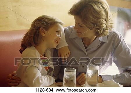 people, water, glasses, mother, drinking, hugging View Large Photo Image Picture - people, water, glasses, mother, drinking, hugging. Fotosearch