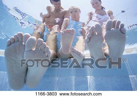people, water, pool, swimming, family, feet, soaking View Large Photo Image Stock Image - people, water, pool, swimming, family, feet, soaking. Fotosearch
