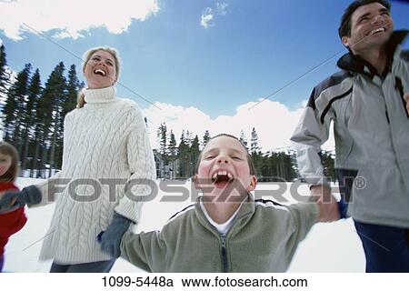 Stock Image - people, winter, outdoors, outings, unity, family, vacation. Fotosearch