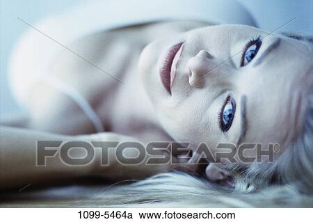 people, woman, blond, laying, indoors, headshot, Caucasian View Large Photo Image Stock Image - people, woman, blond, laying, indoors, headshot, Caucasian. Fotosearch