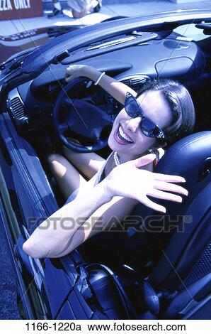 people, woman, blue, car, driving, sunglasses, outdoors View Large Photo Image Stock Image - people, woman, blue, car, driving, sunglasses, outdoors. Fotosearch