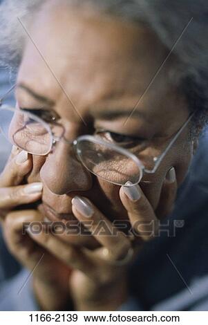 people, woman, eyeglasses, senior, concentration, stress, concentrating View Large Photo Image Stock Photo - people, woman, eyeglasses, senior, concentration, stress, concentrating. Fotosearch