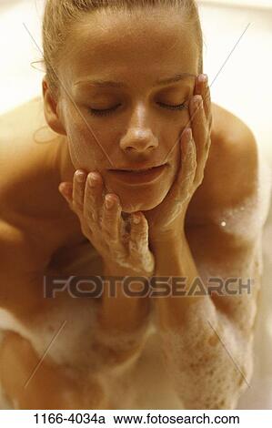 people, woman, face, bath, washing, wash, indoors View Large Photo Image Stock Image - people, woman, face, bath, washing, wash, indoors. Fotosearch