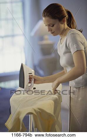 people, woman, indoors, young adult, Young women indoors View Large Photo Image Stock Image - people, woman, indoors, young adult, Young women indoors. Fotosearch