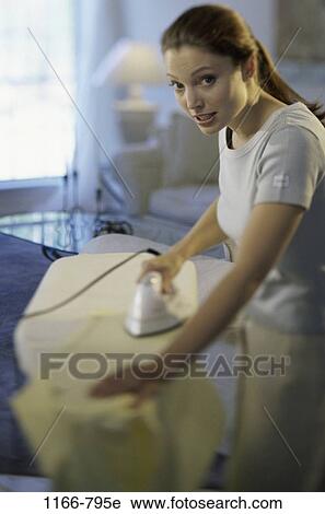 people, woman, indoors, young adult, Young women indoors View Large Photo Image Stock Image - people, woman, indoors, young adult, Young women indoors. Fotosearch