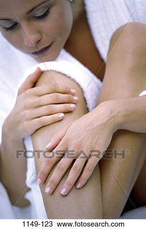 people, woman, legs, relaxing, lotion, bathrobe, clean View Large Photo Image Stock Image - people, woman, legs, relaxing, lotion, bathrobe, clean. Fotosearch