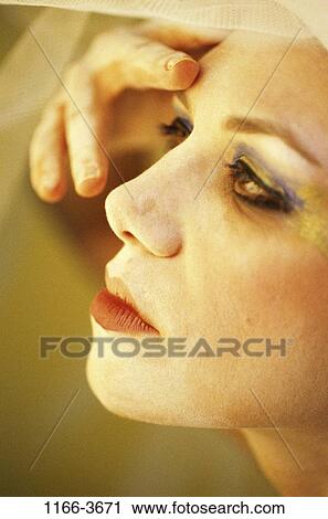 Stock Image - people, woman, makeup, Middle-aged, indoors, headshot, Caucasian. Fotosearch