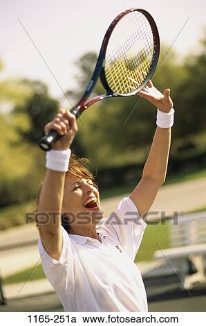 Stock Image - people, woman, playing, tennis, gesturing, outdoors, sports. Fotosearch