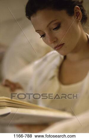 people, woman, reading, concentrating, brunette, indoors View Large Photo Image Stock Photo - people, woman, reading, concentrating, brunette, indoors. Fotosearch