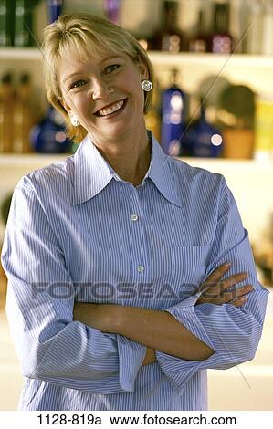 people, woman, smiling, Middle-aged, smile, proud, blond View Large Photo Image Stock Image - people, woman, smiling, Middle-aged, smile, proud, blond. Fotosearch