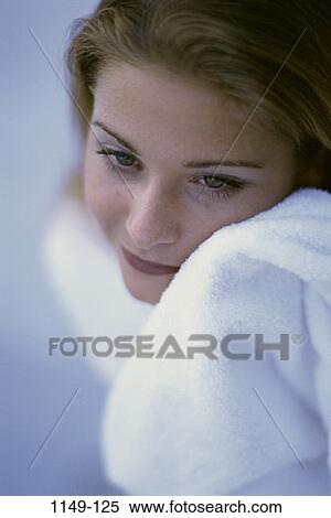 Stock Photography - people, woman, smiling, staring, soft, towel, smile. Fotosearch