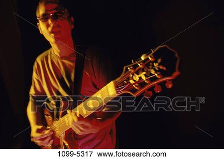 playing, music, guitar, arts, entertainment View Large Photo Image Stock Photo - playing, music, guitar, arts, entertainment. Fotosearch