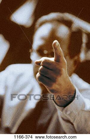 Picture - pointing, business, concepts, challenges, confrontation, Middle-aged. Fotosearch