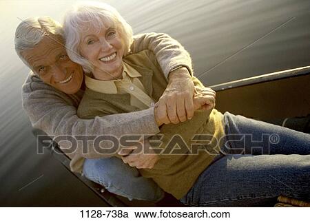 relaxed, people, couple, senior, lake, boating, outdoors View Large Photo Image Stock Image - relaxed, people, couple, senior, lake, boating, outdoors. Fotosearch