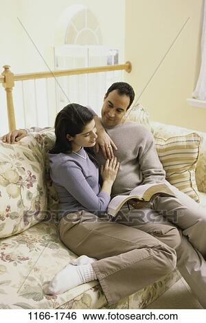 relaxed, people, railing, couple, Hispanic, reading, couch View Large Photo Image Stock Photograph - relaxed, people, railing, couple, Hispanic, reading, couch. Fotosearch