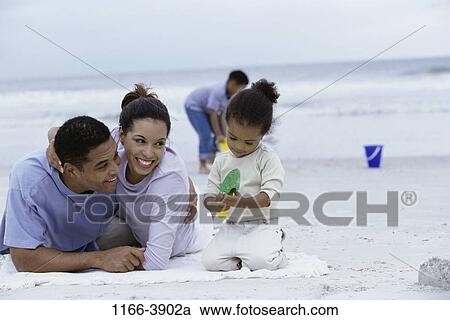 sand, people, beach, shovel, family, vacation, daughter View Large Photo Image Stock Image - sand, people, beach, shovel, family, vacation, daughter. Fotosearch