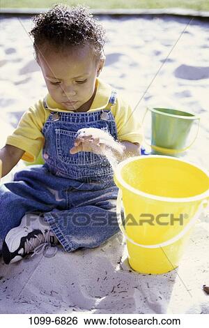sand, people, playing, sitting, playground, boy, outdoors View Large Photo Image Stock Photograph - sand, people, playing, sitting, playground, boy, outdoors. Fotosearch