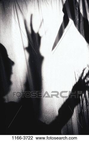 Stock Image - shadows, knife, violence, risk, death, frightened, yelling. Fotosearch