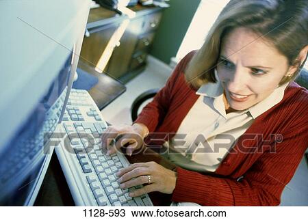 sitting, headache, staring, woman, desk, computer, attentive View Large Photo Image Stock Image - sitting, headache, staring, woman, desk, computer, attentive. Fotosearch
