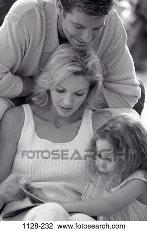 Stock Image - sitting, people, listening, talking, smiling, mother, attentive. Fotosearch