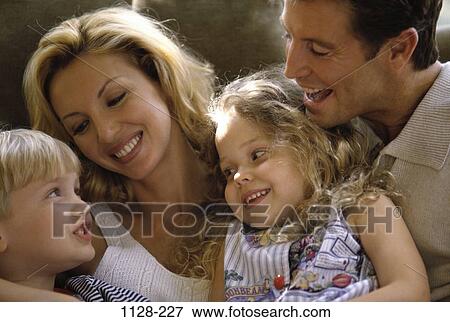Stock Photo - sitting, people, listening, talking, smiling, mother, attentive. Fotosearch