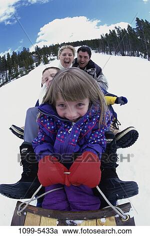 sky, people, snow, smiling, playing, clouds, winter View Large Photo Image Stock Image - sky, people, snow, smiling, playing, clouds, winter. Fotosearch