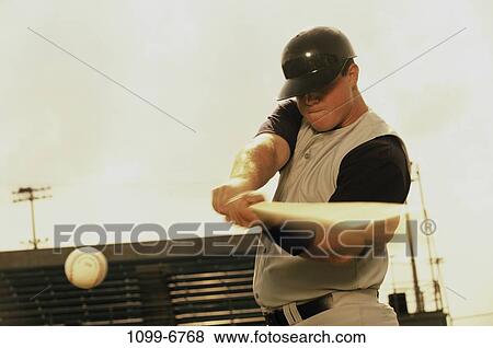Stock Photo - strike, people, playing, bat, helmet, baseball. Fotosearch