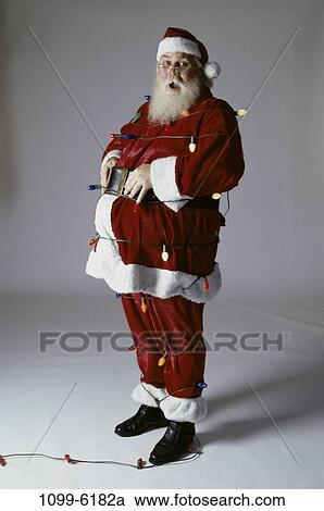 suit, wrapped, Christmas, beard, lights, Christmas lights View Large Photo Image Stock Image - suit, wrapped, Christmas, beard, lights, Christmas lights. Fotosearch