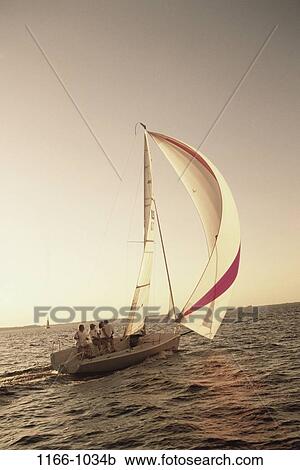 sunset, sports, water sports, boat, sailboat, sailing, sail View Large Photo Image Stock Image - sunset, sports, water sports, boat, sailboat, sailing, sail. Fotosearch