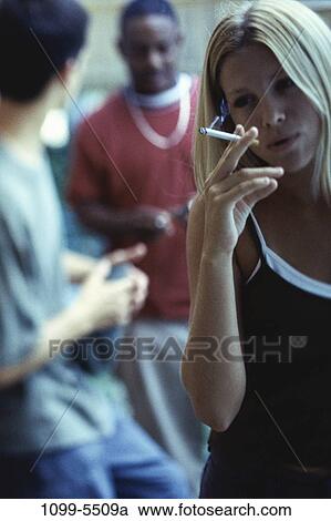 tobacco, multiethnic, people, blur, smoke, cigarette, holding View Large Photo Image Stock Image - tobacco, multiethnic, people, blur, smoke, cigarette, holding. Fotosearch
