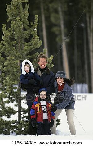 tree, people, snow, winter, cold, outdoors, family View Large Photo Image Stock Image - tree, people, snow, winter, cold, outdoors, family. Fotosearch