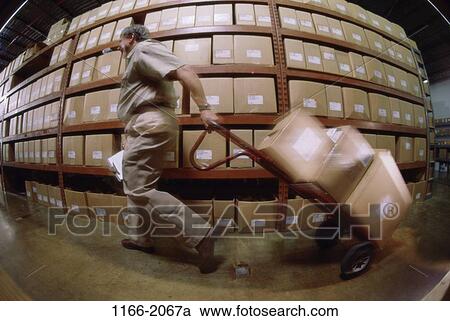 Stock Image - warehouse, shelves, boxes, uniform, inventory, stock. Fotosearch
