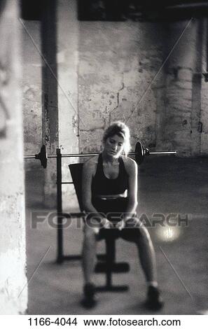woman, building, bench, equipment, serious, blond, tired View Large Photo Image Picture - woman, building, bench, equipment, serious, blond, tired. Fotosearch