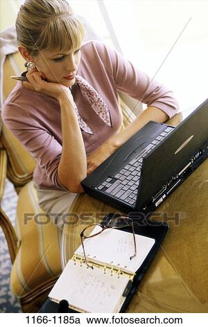 woman, eyeglasses, laptop, notebook, serious, indoors, Caucasian View Large Photo Image Stock Image - woman, eyeglasses, laptop, notebook, serious, indoors, Caucasian. Fotosearch