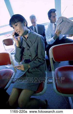 woman, telephone, newspaper, Asian, phone, business, transportation View Large Photo Image Stock Image - woman, telephone, newspaper, Asian, phone, business, transportation. Fotosearch