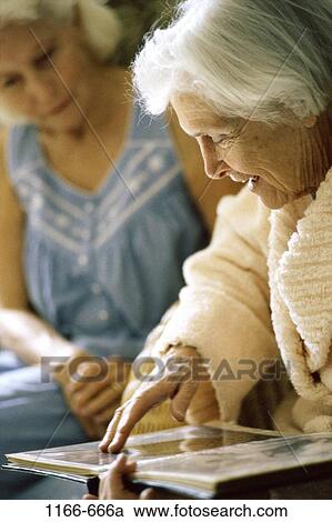 women, people, senior, nursing home, looking, showing, sharing View Large Photo Image Stock Image - women, people, senior, nursing home, looking, showing, sharing. Fotosearch