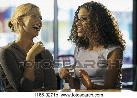 women, people, together, young adult, Young women together View Large Photo Image Stock Image - women, people, together, young adult, Young women together. Fotosearch