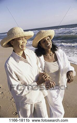 women, relaxed, people, hands, walking, conversation, hats View Large Photo Image Stock Image - women, relaxed, people, hands, walking, conversation, hats. Fotosearch
